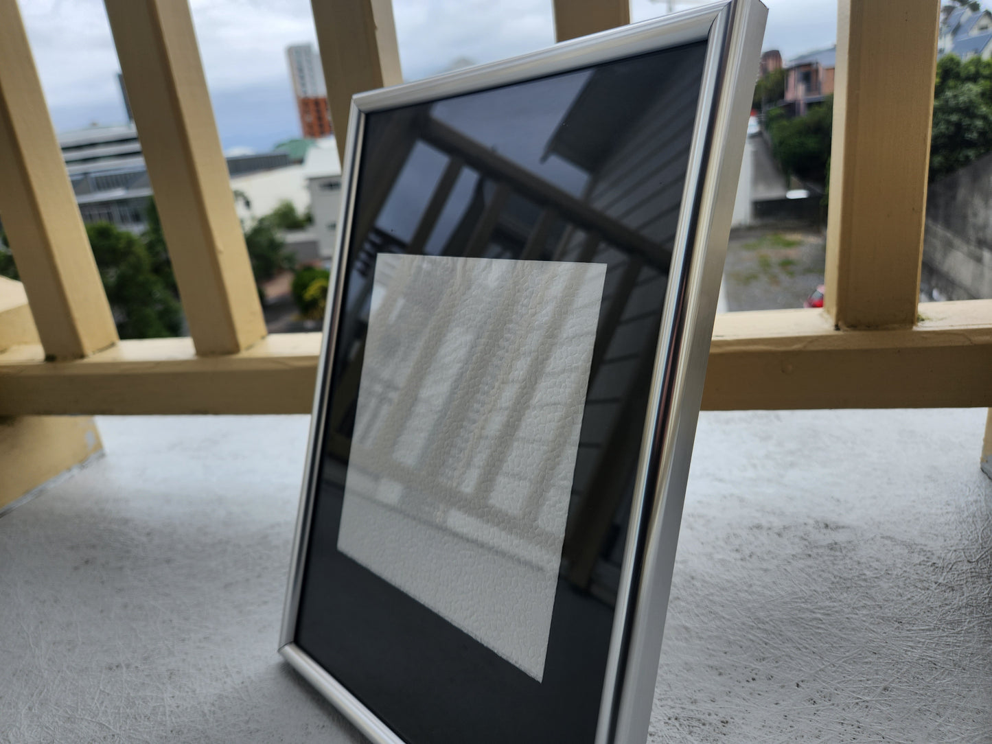 Hundred thousand dollar napkin in silver frame